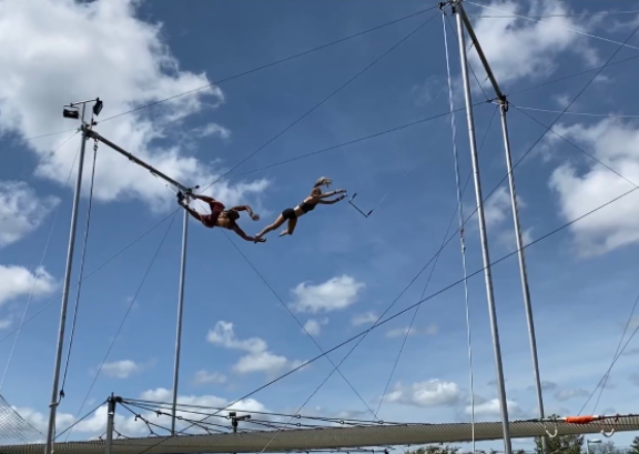 Trapeze artist shares experiences as new year swings in