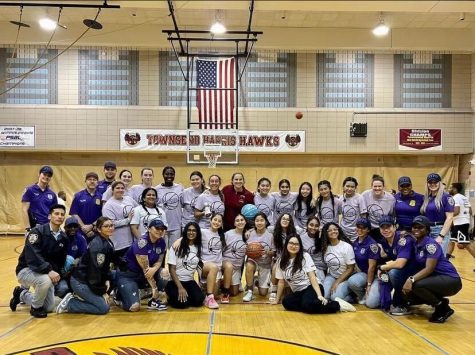 The Girls Varsity Basketball Team and NYPD Officers at the Coaches Vs Cancer event. 