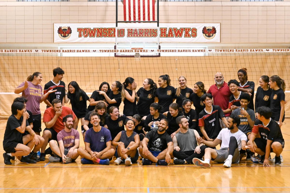 The participants of the Students vs. Faculty volleyball game, where teachers played a game against volleyball team members.