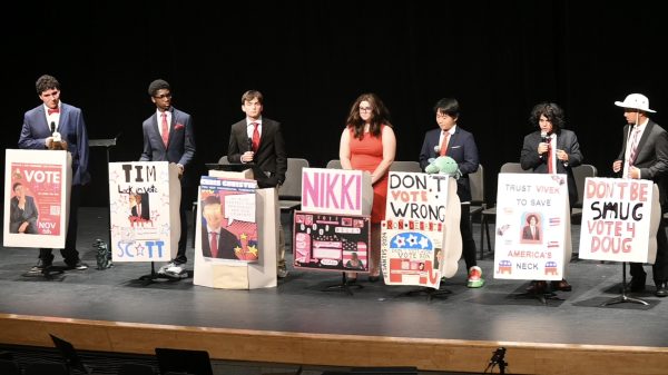 Presidential candidates on stage during the election debate.