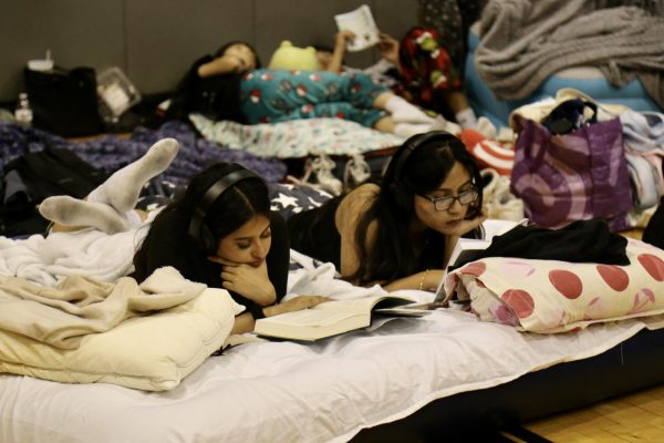 Students reading at the event.