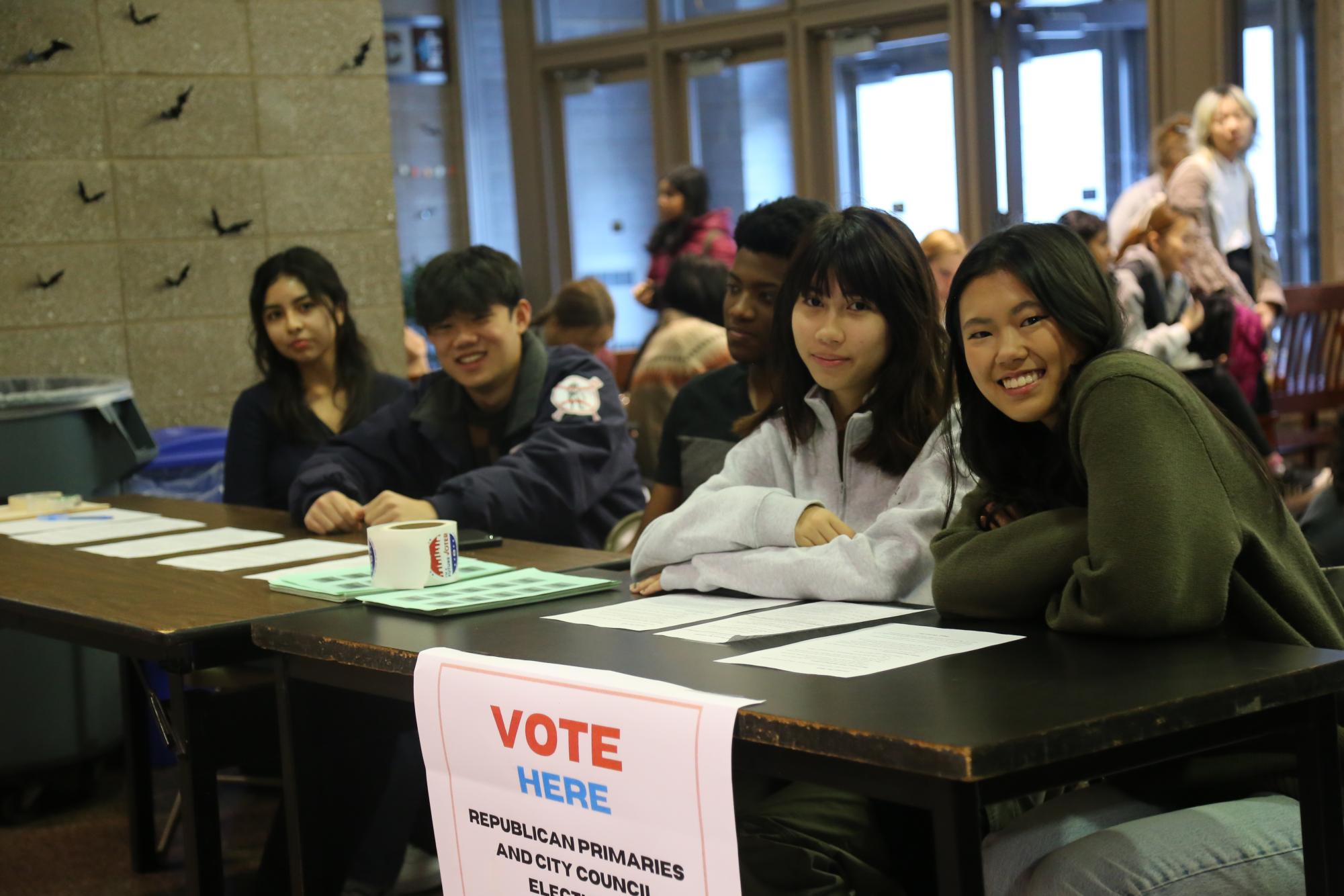 Students helping out with the voting ballots for Election Simulation on November 5. 