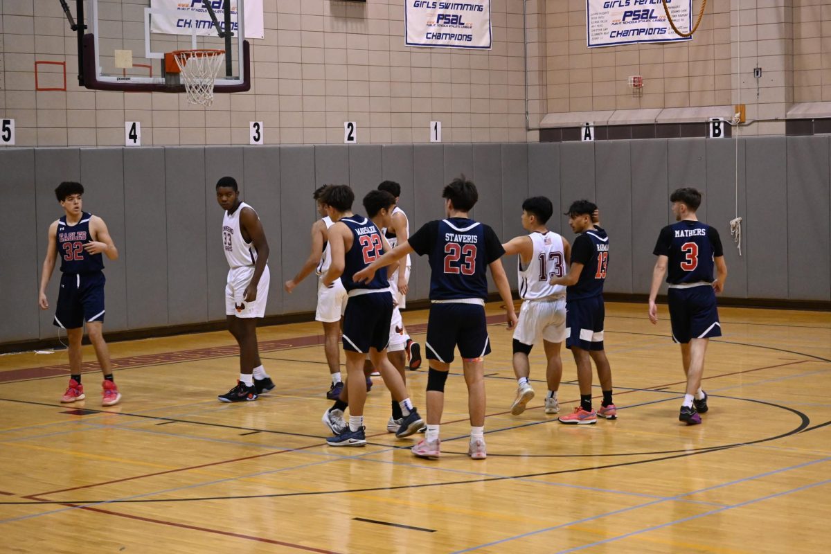 The Boys Varsity Basketball team playing against the Academy of American Studies on Wednesday, November 29. The final score was 68-50 (Academy of American Studies).