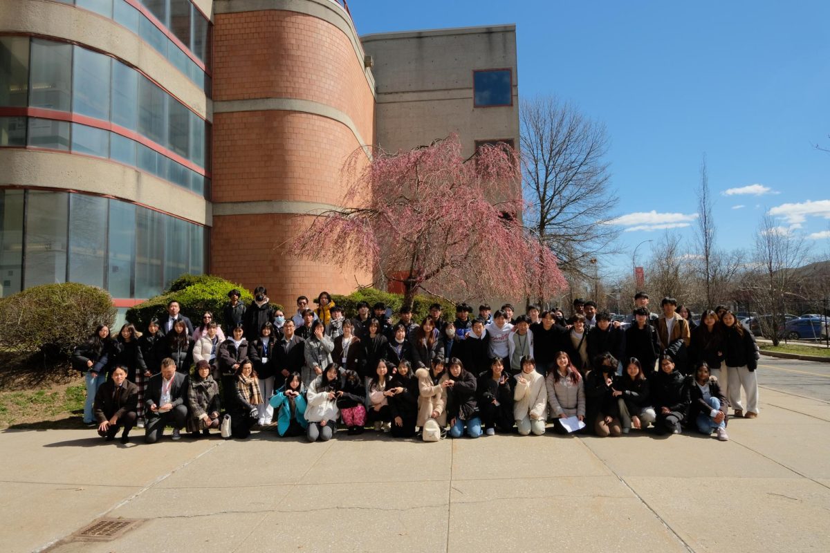 On Thursday, March 21, students from Shimoda High School (Townsend Harris sister school in Japan) visited and engaged in various activities. Shown is the students and teachers at the cherry blossom tree ceramony that took place to commemorate the friendship between the two schools.