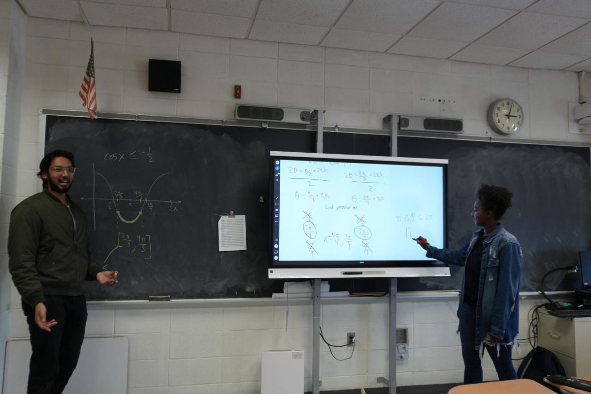Math+teachers+Abid+Choudhury+and+Kayla+Gill+teach+in+an+ICT+math+class.