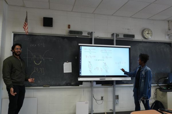 Math teachers Abid Choudhury and Kayla Gill teach in an ICT math class.