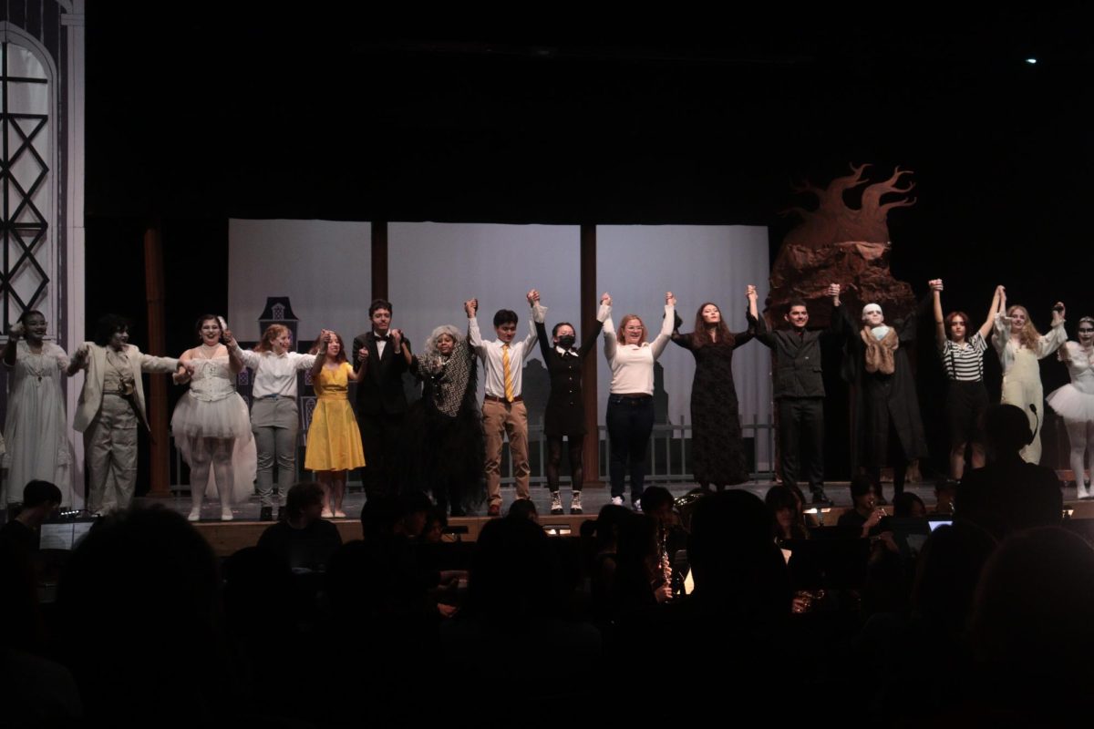 The cast bows at the end of last year's musical, "The Addams Family." This year, the play will be "Little Shop of Horrors."
