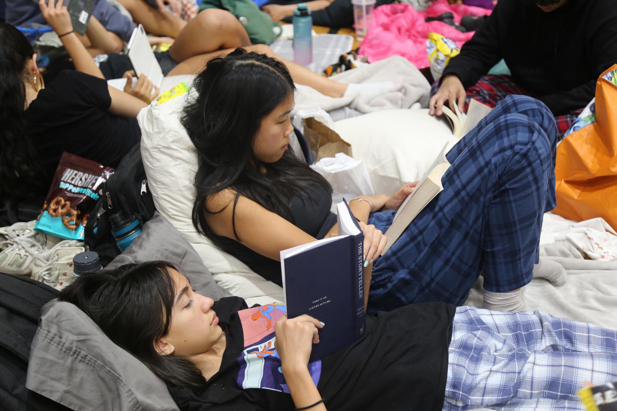 Students reading during one of the independent reading sessions at the Witching Hour.