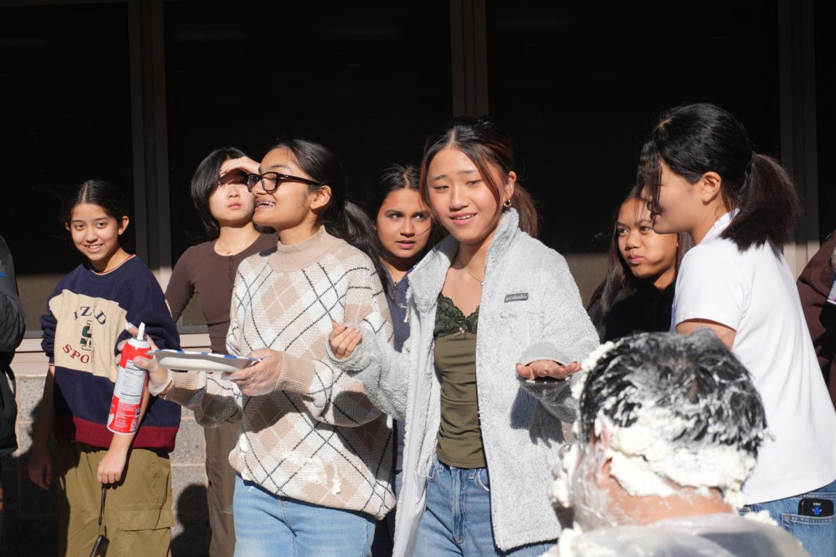 Teachers and Students Union Members getting pied during the Winter Party