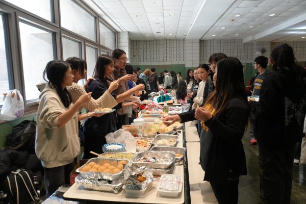 Students attending and enjoying the food at Asian Fest