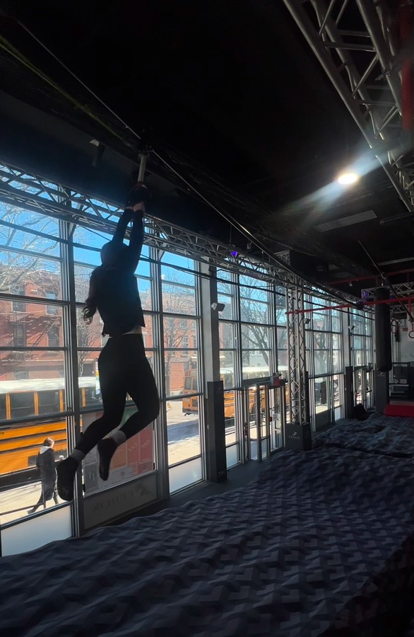 Students attempting the obstacle course at Ferox Ninja Park