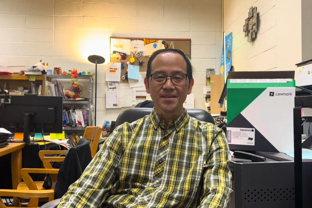 Tech coordinator, physics teacher and sports coach John Tsai