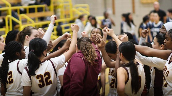 The THHS Girls Varsity Basketball Team during their first playoff game against Francis Lewis High School