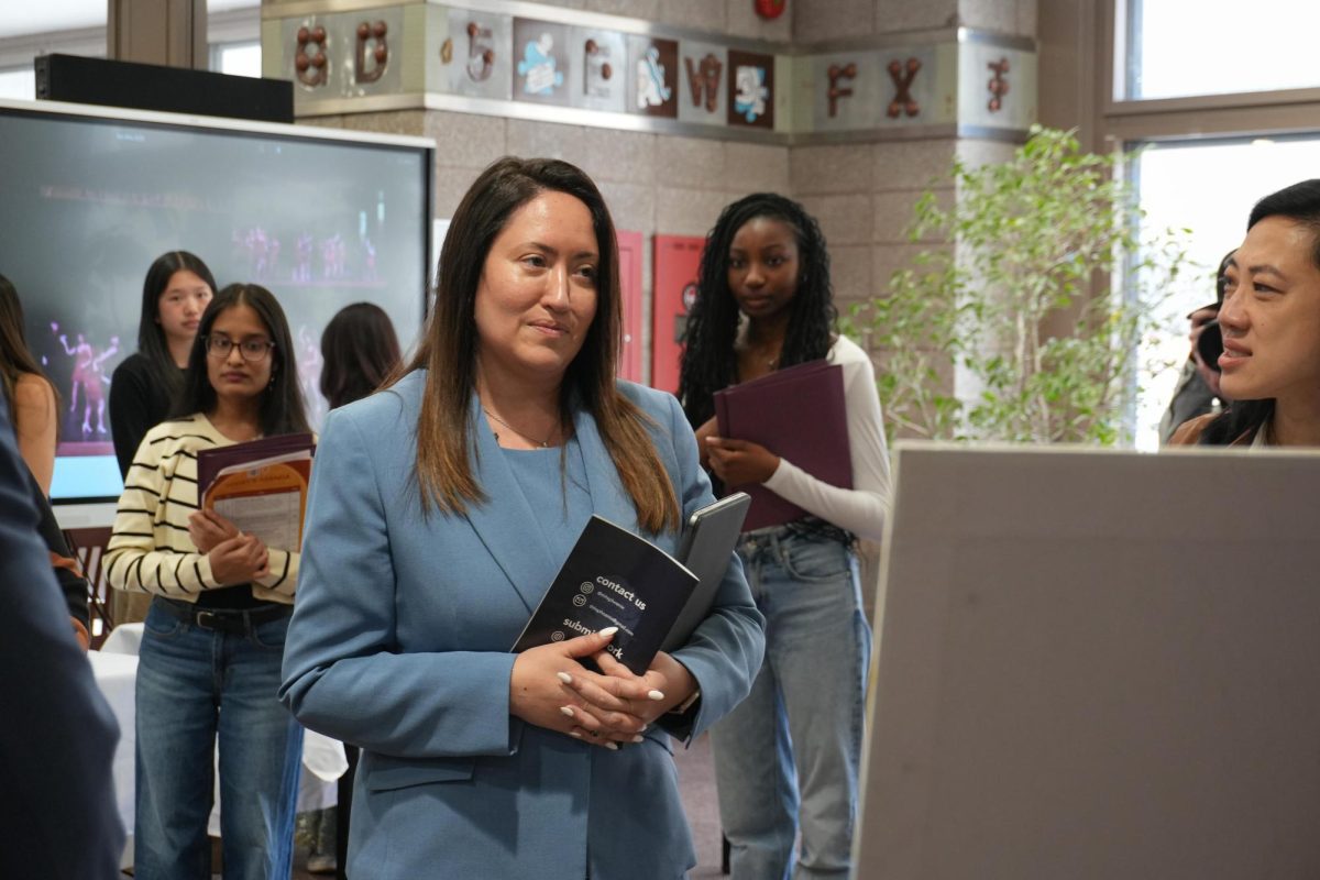 Chancellor Melissa Aviles-Ramos arrives to the Townsend Harris lobby and gets a tour of student clubs and activities.