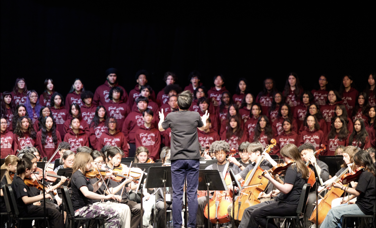 The Ensemble Orchestra (a collaboration between THHS and FHHS musicians) performs under the direction of Mr. Lee. Photo courtesy of Ryan King (FHHS Concert Choir Co-Director).