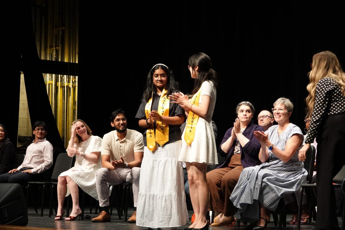 Salutatorian Shamonti Shamim and Valedictorian Jenney Huang on stage after both their awards were announced