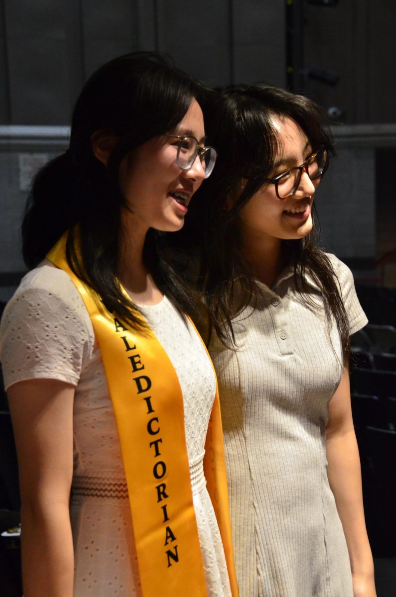 Students posing with Valedictorian Jenney Huang