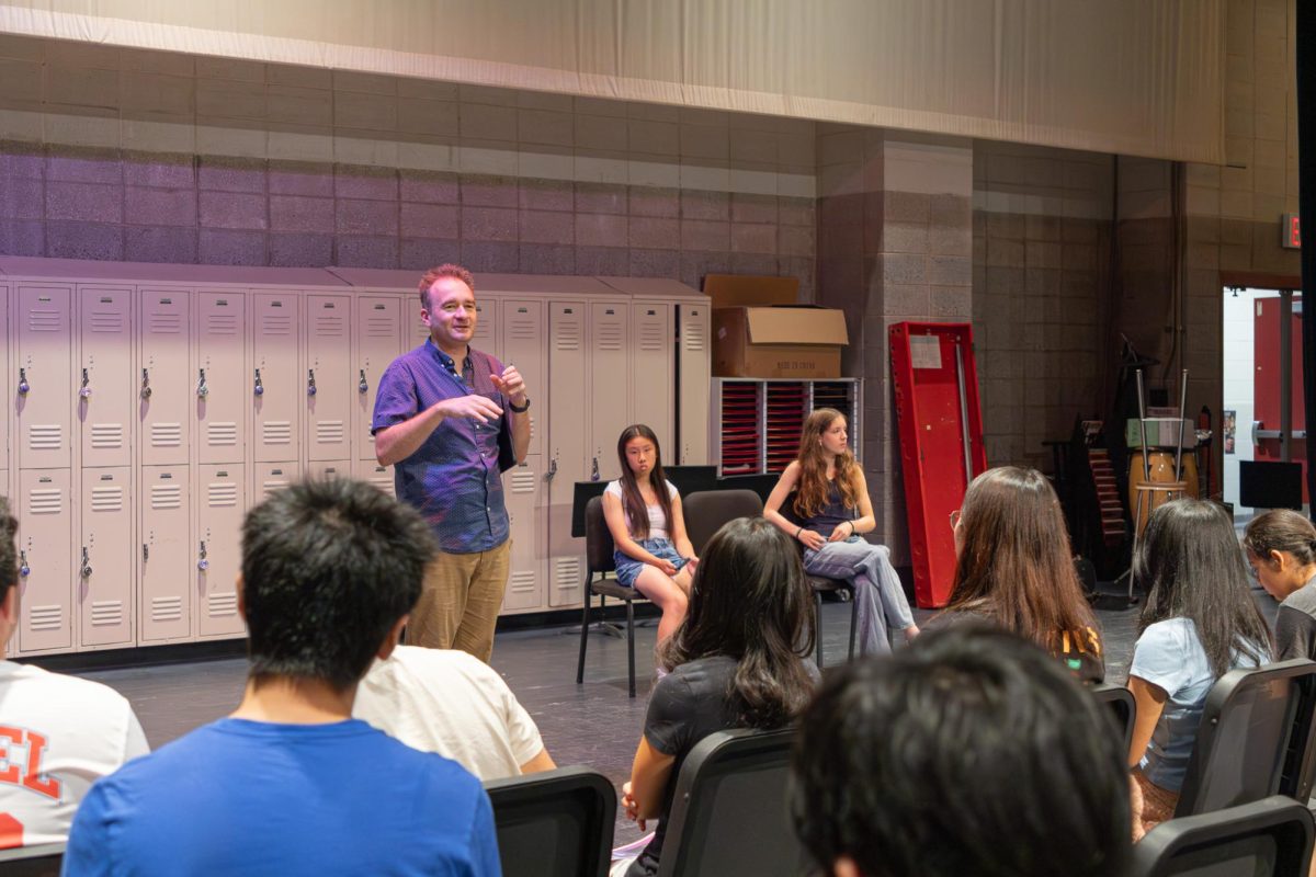 Mr. Lacker speaks to the audience in advance of the summer performance.