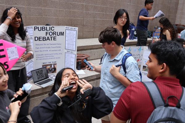 Students promoting Public Forum Debate in the courtyard during the Club Fair last September. Since the club began at THHS, membership has grown.