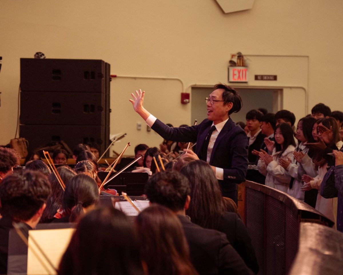 Mr. Lee conducting the THHS Symphony Orchestra during their performance of The Star-Spangled Banner
