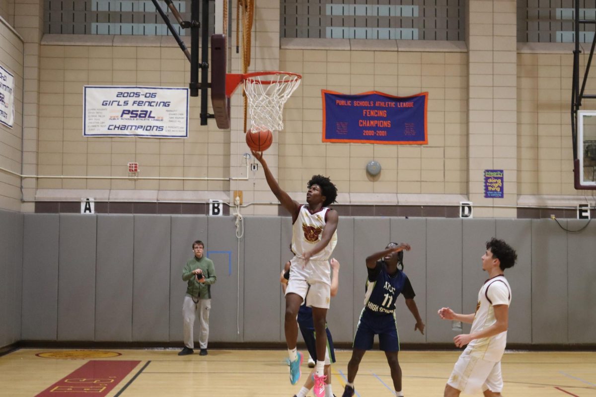Junior Aidan Alleyne executing a layup against ATLAS on January 6.
Philip Januszewski.
