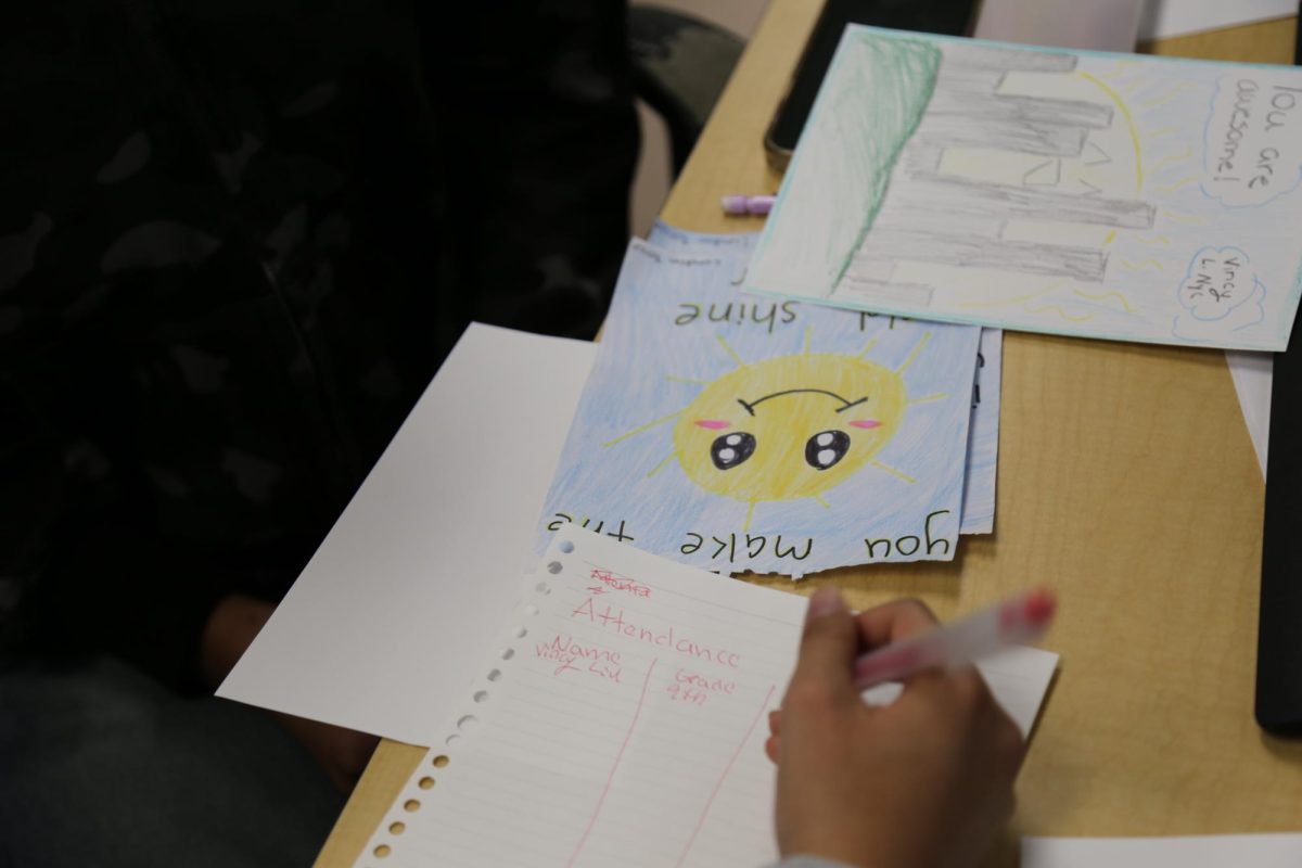 Members of Cardz for kids write and illustrate cards to cheer people up.