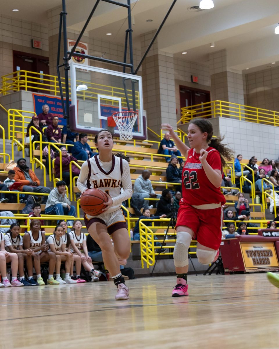 Sophomore point guard Ava Yan prepares to make a shot in the first round of playoffs against Fiorello H. LaGuardia High School on February 26