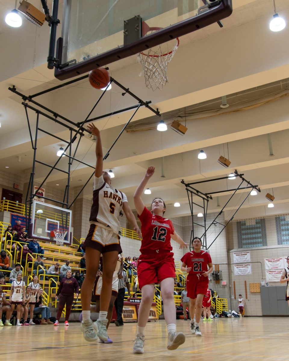 Junior Sophia Madrazo shooting a layup during the girls varsity basketball game against Fiorello H. LaGuardia High School on February 26.
