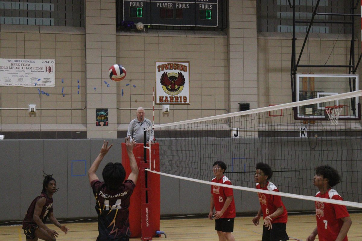Alumnus Ian Pagcaliwagan sets the ball to alumnus Elijah Shivers. On May 6, 2025, the boys varsity volleyball team competed in Round 1 of the playoffs against Murry Bergtraum, winning a 2-0 victory. 