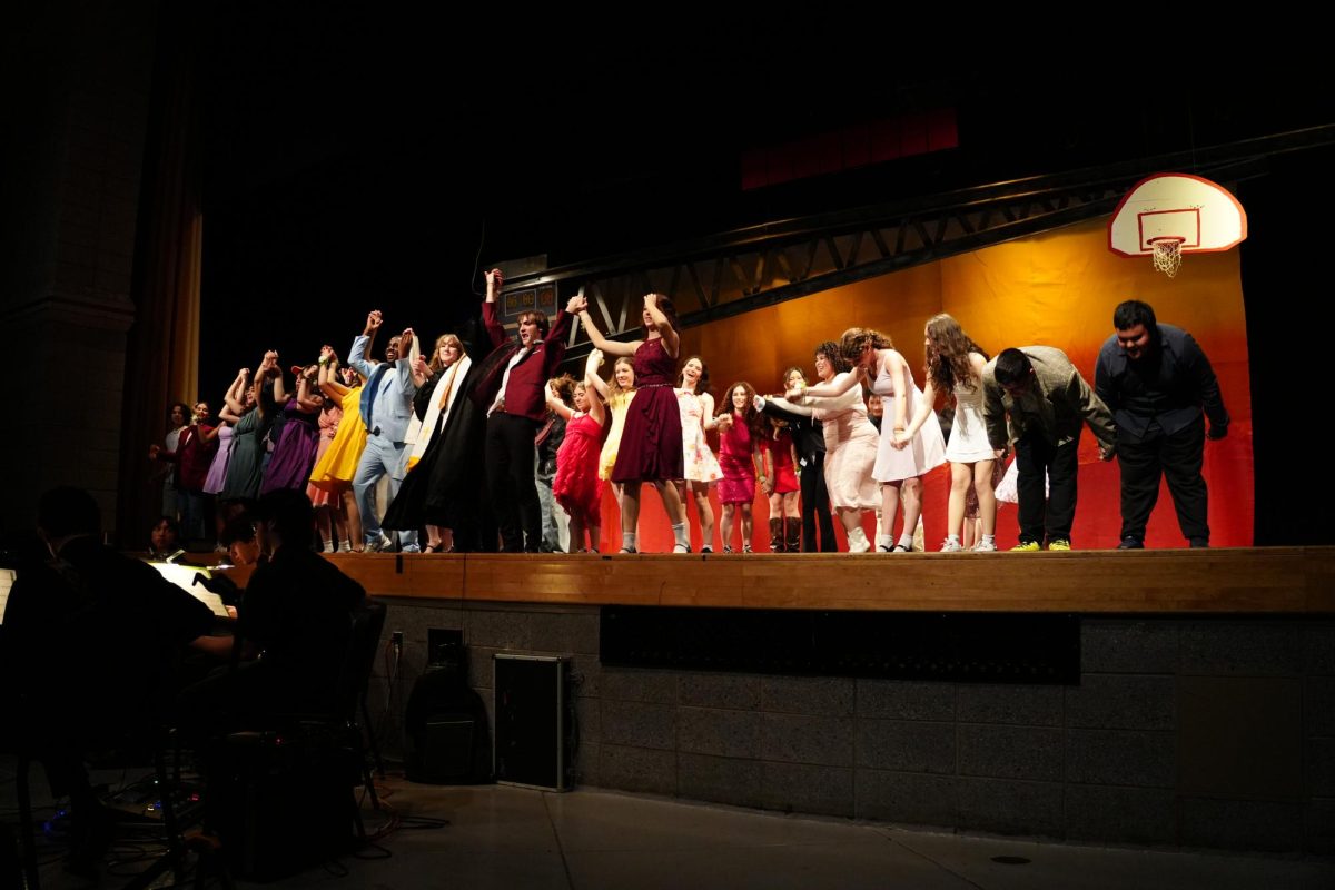The cast of “Footloose” taking a group bow at the end of the April 18 show.
