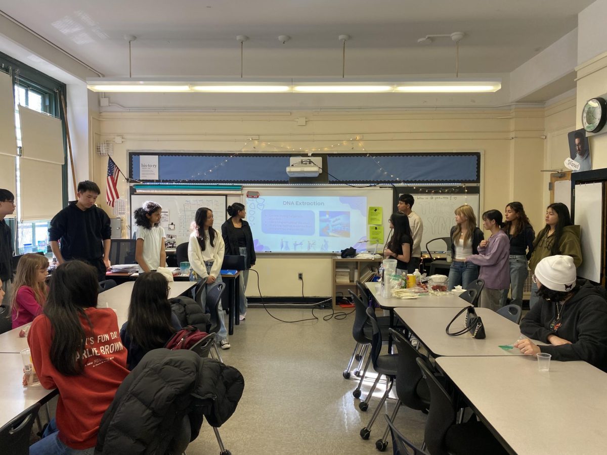 One of YMA's k-8 outreach events where they led a strawberry DNA extraction experiment for middle schoolers and taught them about DNA.