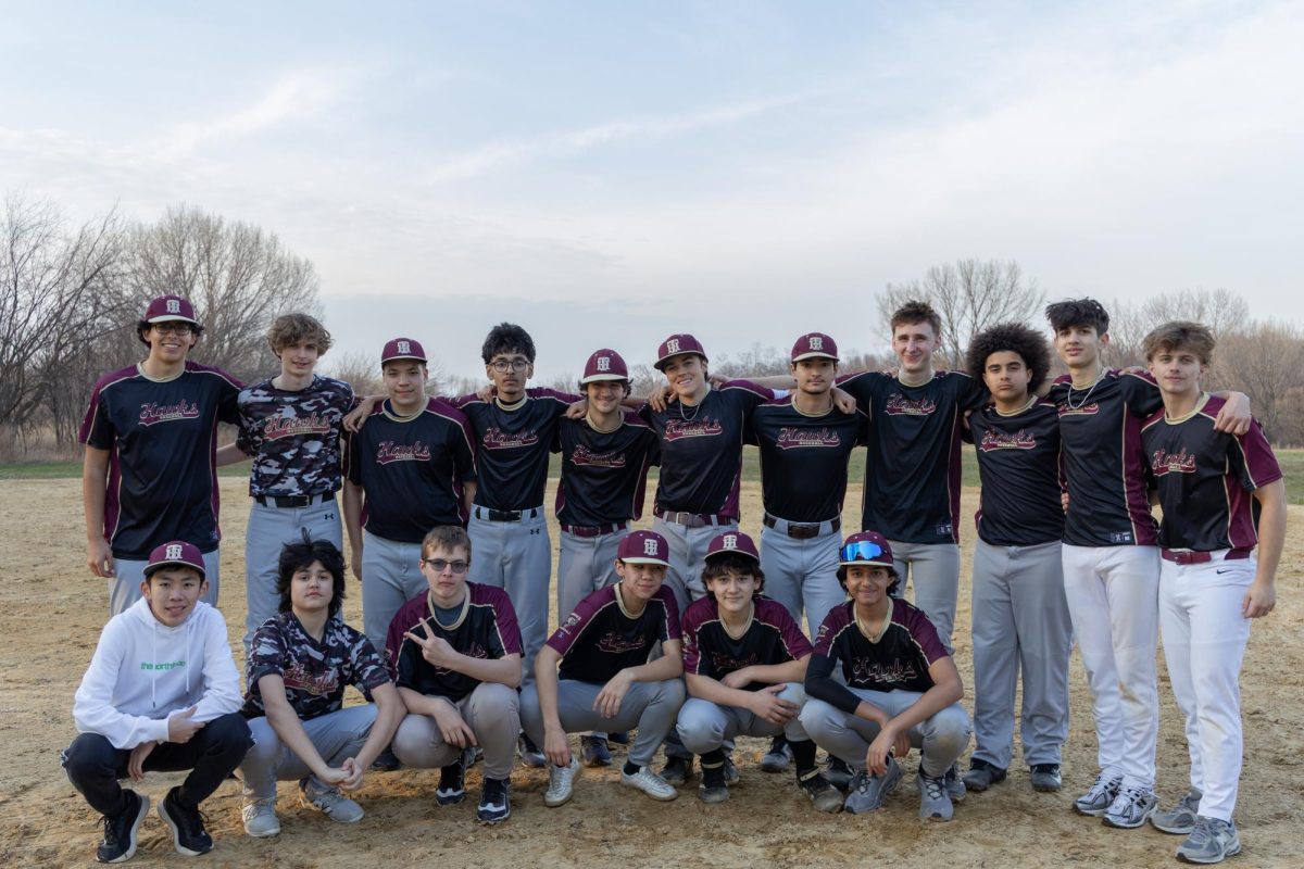 The boys varsity baseball team after their 12-0 victory against August Martin High School on March 26.
