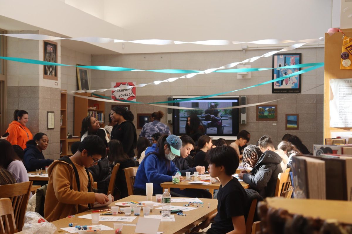 Students participate in the 2025 Henrietta Lacks event. Last year's event was in the library. This year's event took place across multiple rooms on the fifth floor. 