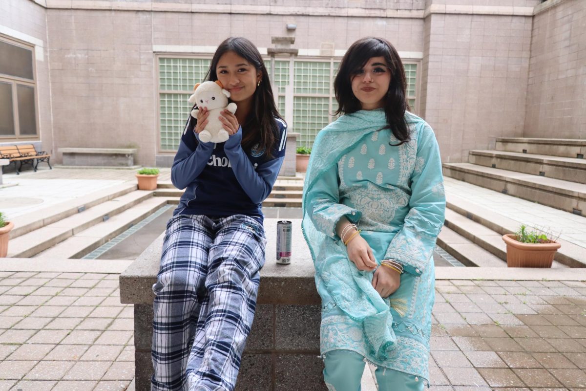 Freshman Mia Martines and sophomore Arzoo-A Shah wearing a cultural outfit and pajamas for Spirit Week:Culture/Pajama Day.