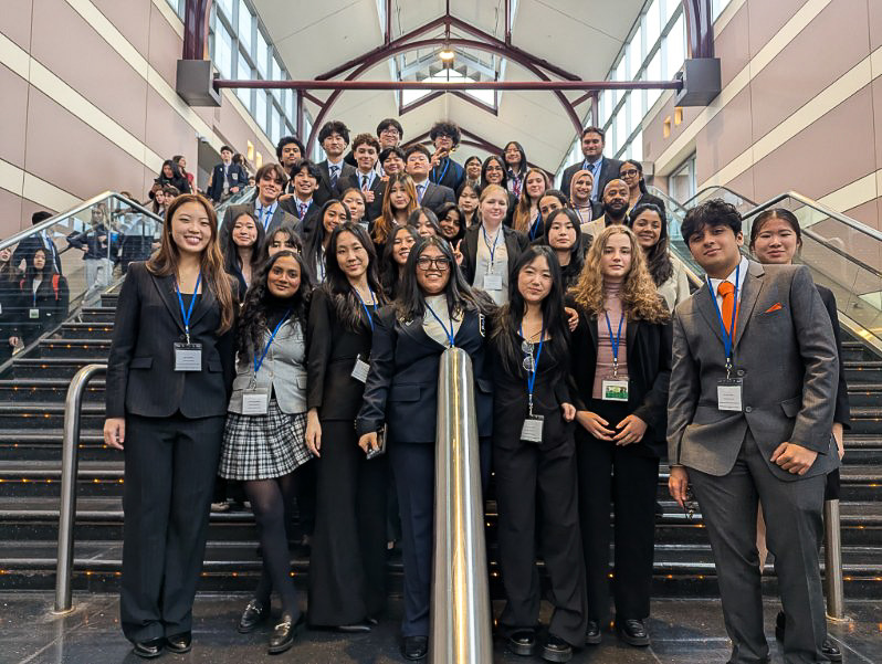 The 35 students from the THHS DECA chapter posing for a photo during the New York Statewide competition in March. 