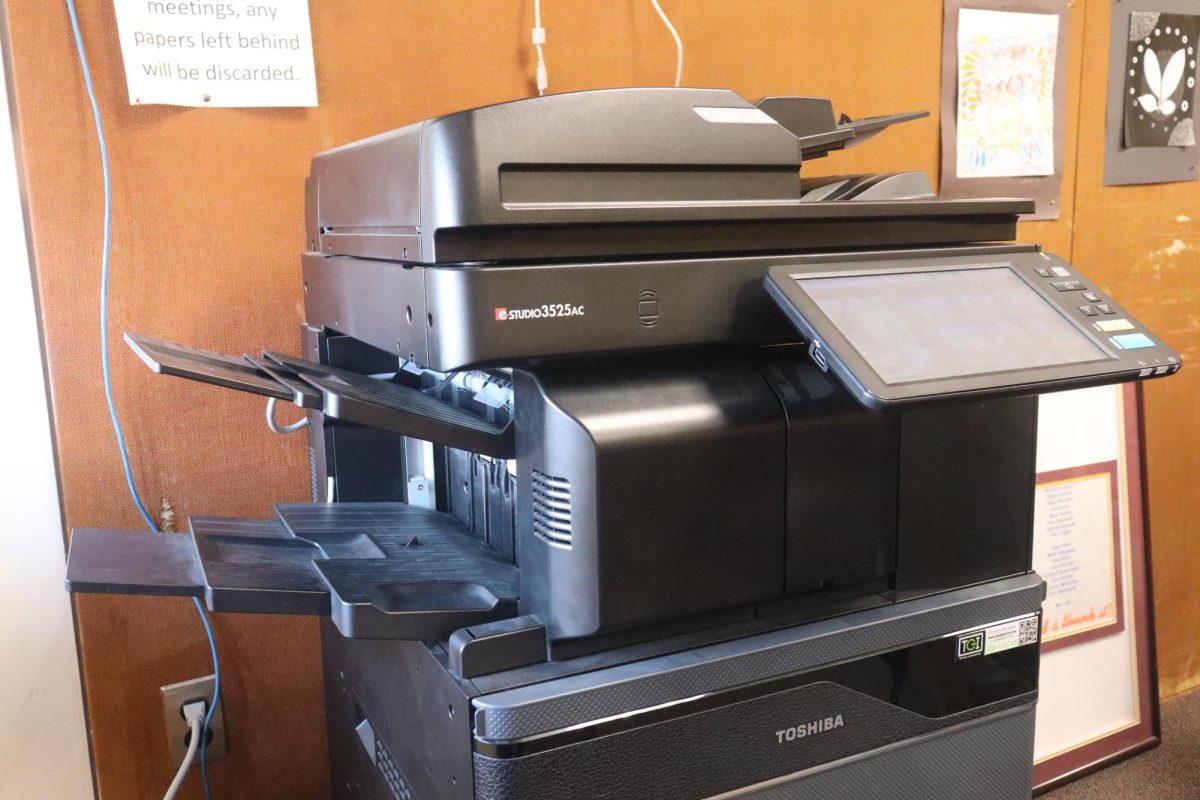 With electronic devices growing less and less popular in schools, copy machines are becoming more prominent .