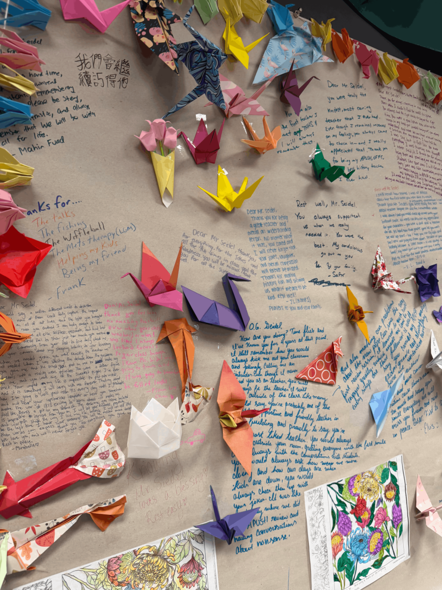 The memorial board in room 415 on which students left messages and artwork in rememberance of Mr. Seidel.