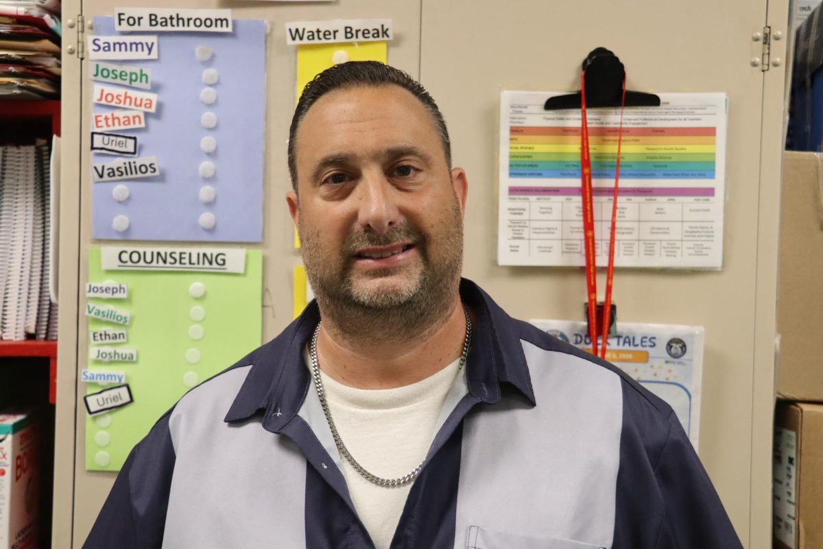 Coach Curiale in his office. Coach Curiale coaches boys varsity soccer, boys varsity wrestling, and girls varsity flag football. 