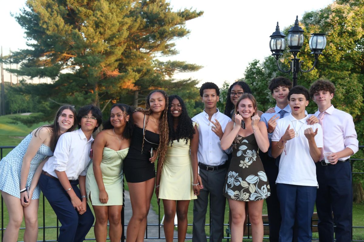 Student-athletes pose for a photo on the patio at the Athletic Awards Dinner on June 16. Sophomore 
Amelia Legaspi said, “I really enjoyed the event overall…and I can’t wait to come back next year.”