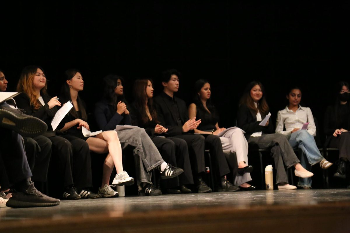 SU Election candidates sitting together onstage during the debate on May 18.