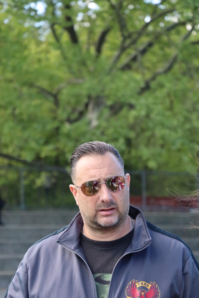Coach Curiale during one of the girls varsity flag football team's games.