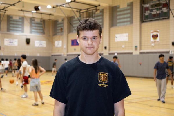 Rising senior Samuele Marcucci poses for a picture inside the Townsend Harris gymnasium.